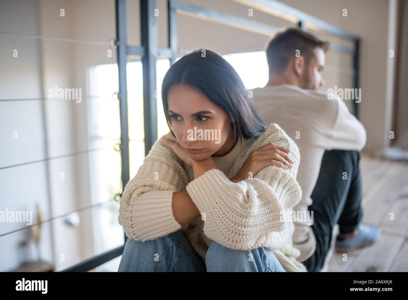 Wife feeling sad after conversation with husband Stock Photo Alamy