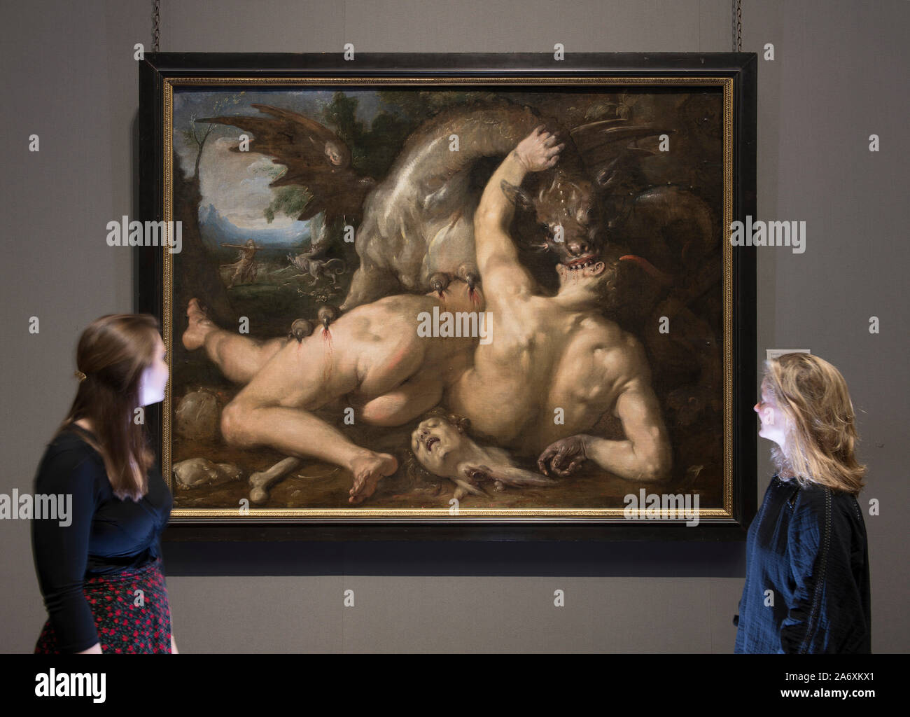 National Gallery, London, UK. 17th October 2019.  Photo embargoed until 29th October 2019. The National Gallery choose two pictures with a spooky horror Halloween theme for the 31st October, posed with members of staff. Image: Two Followers of Cadmus devoured by a Dragon. Cornelius van Haarlem, 1588. The National Gallery, London. Credit: Malcolm Park/Alamy Live News. Stock Photo