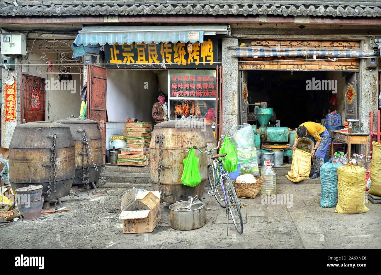 Dali, Yunnan province, China. 04-26-2016. Food shops in Dali city. Stock Photo