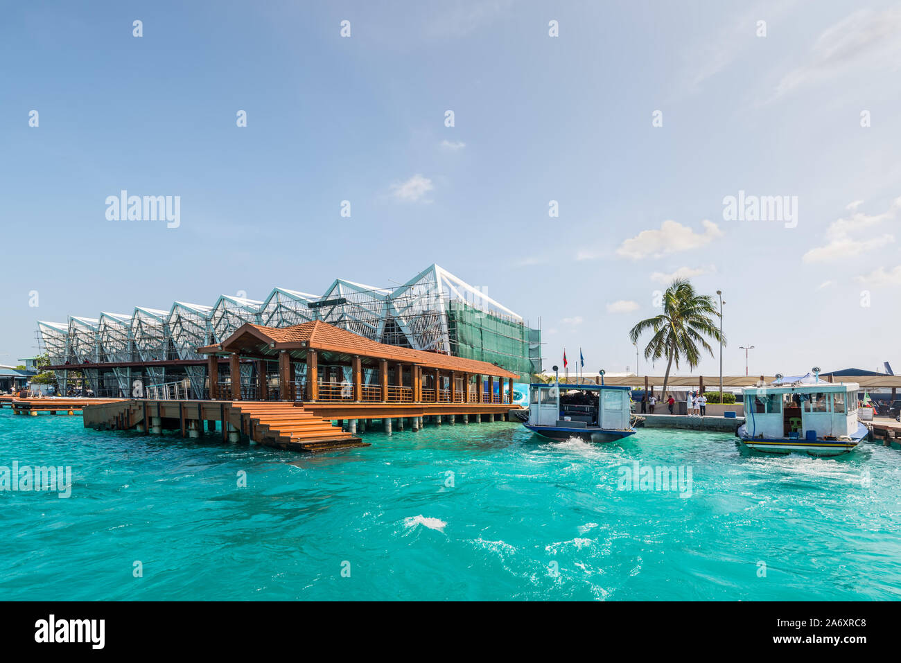 Hulhule Island, Maldives - November 18, 2017: Maritime station and pier at the Ibrahim Nasir International Airport, Maldives, Indian Ocean. Stock Photo