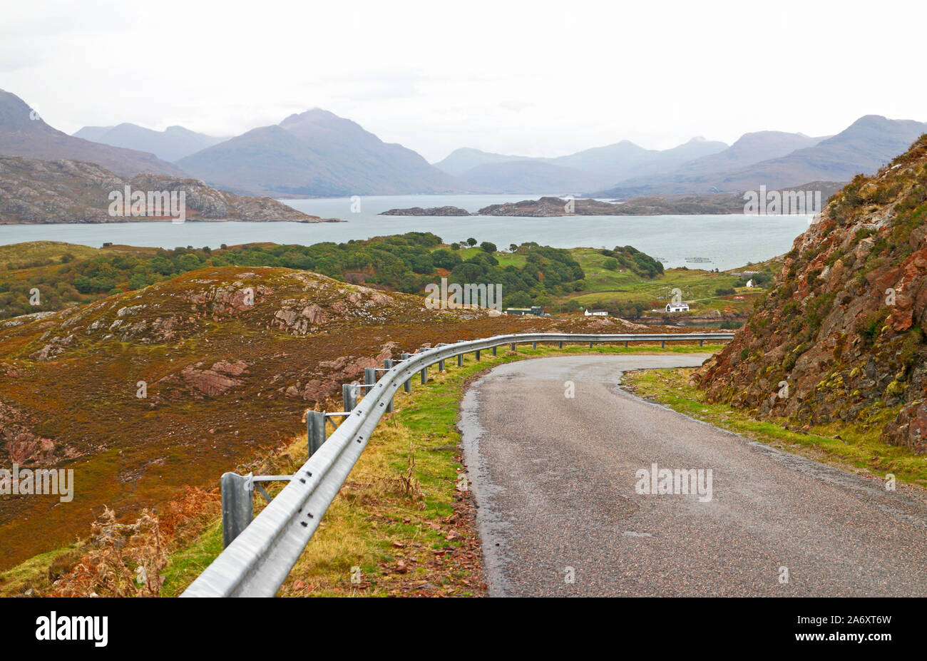 A view from the coast road over the sea towards the Isle of Skye north of Applecross, Wester Ross, Scotland, United Kingdom, Europe. Stock Photo