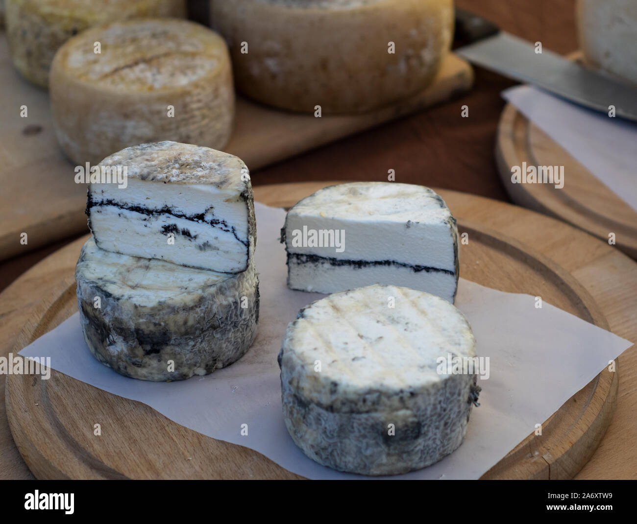 fresh goat's milk cheeses made by hand Stock Photo Alamy