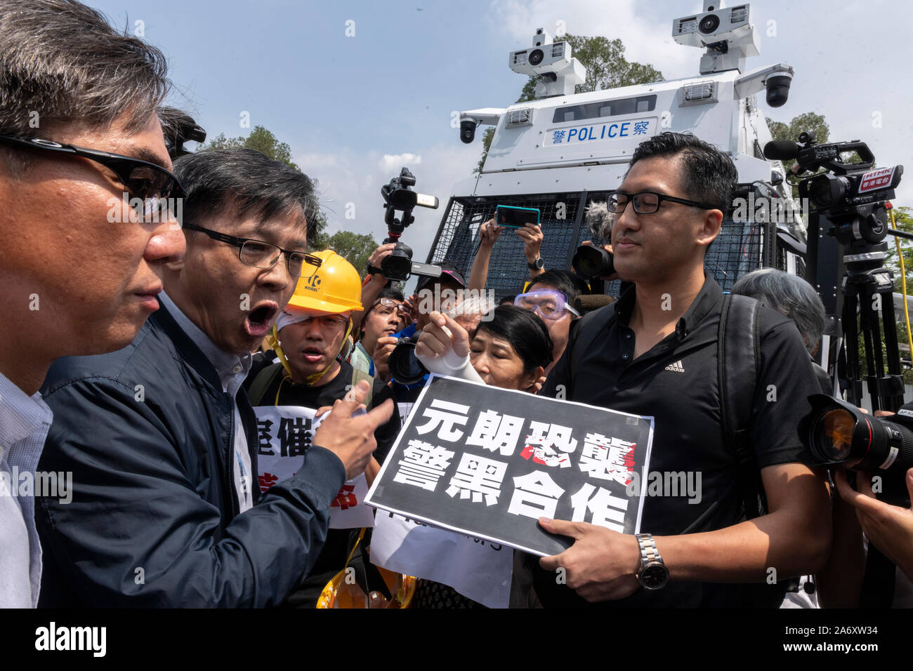 Pro-Beijing lawmaker Junius Ho Kwan-yiu (L) has been stripped of an honorary law degree by his alma mater, Anglia Ruskin University Cambridge, for sha Stock Photo
