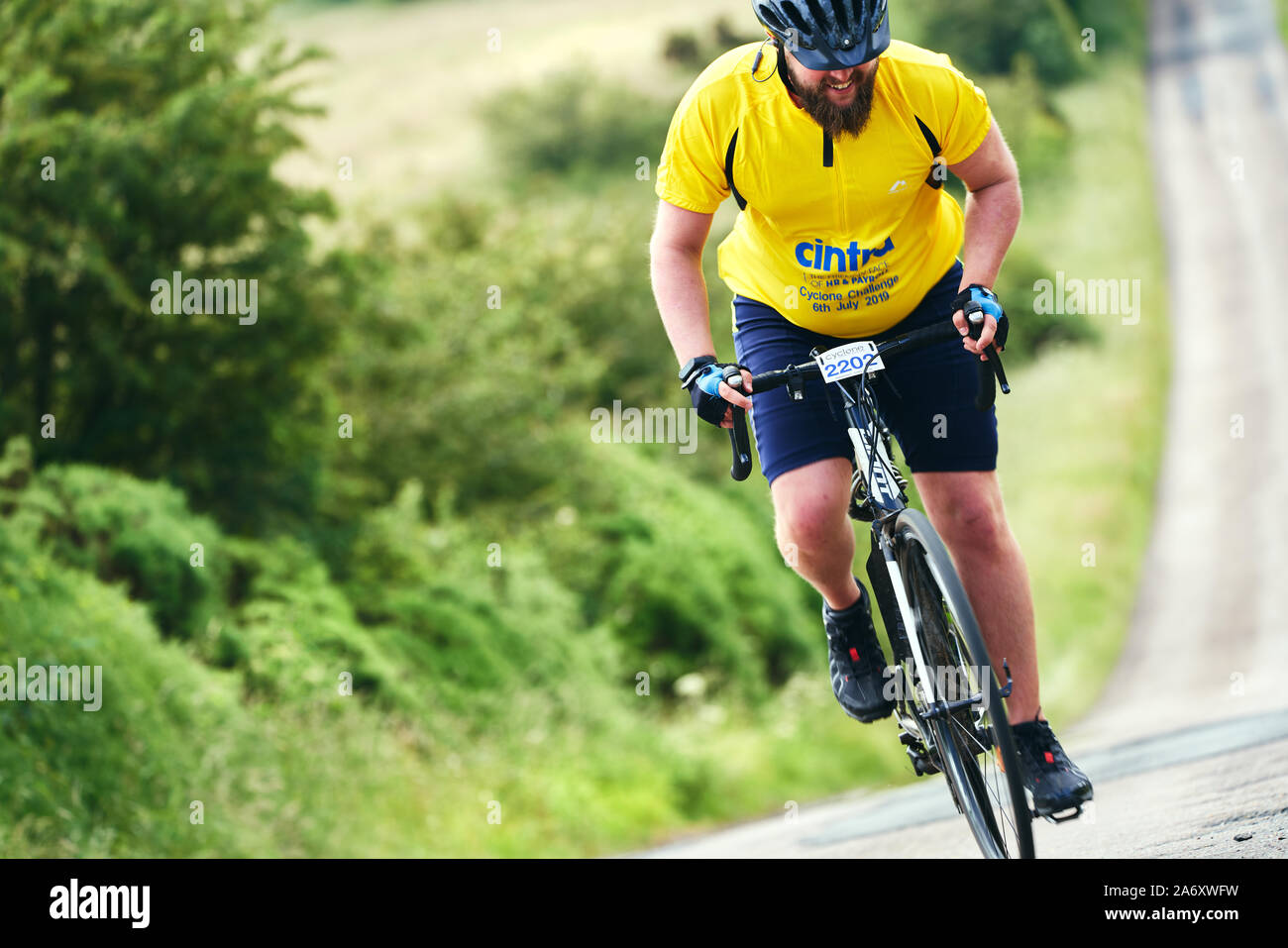Overweight man bike hires stock photography and images Alamy