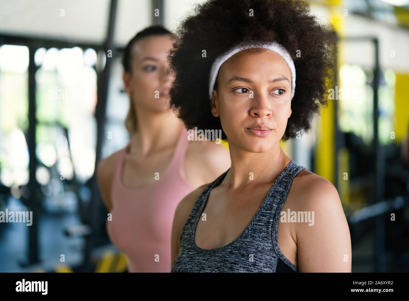 Portrait of young african fitness woman in gym Stock Photo
