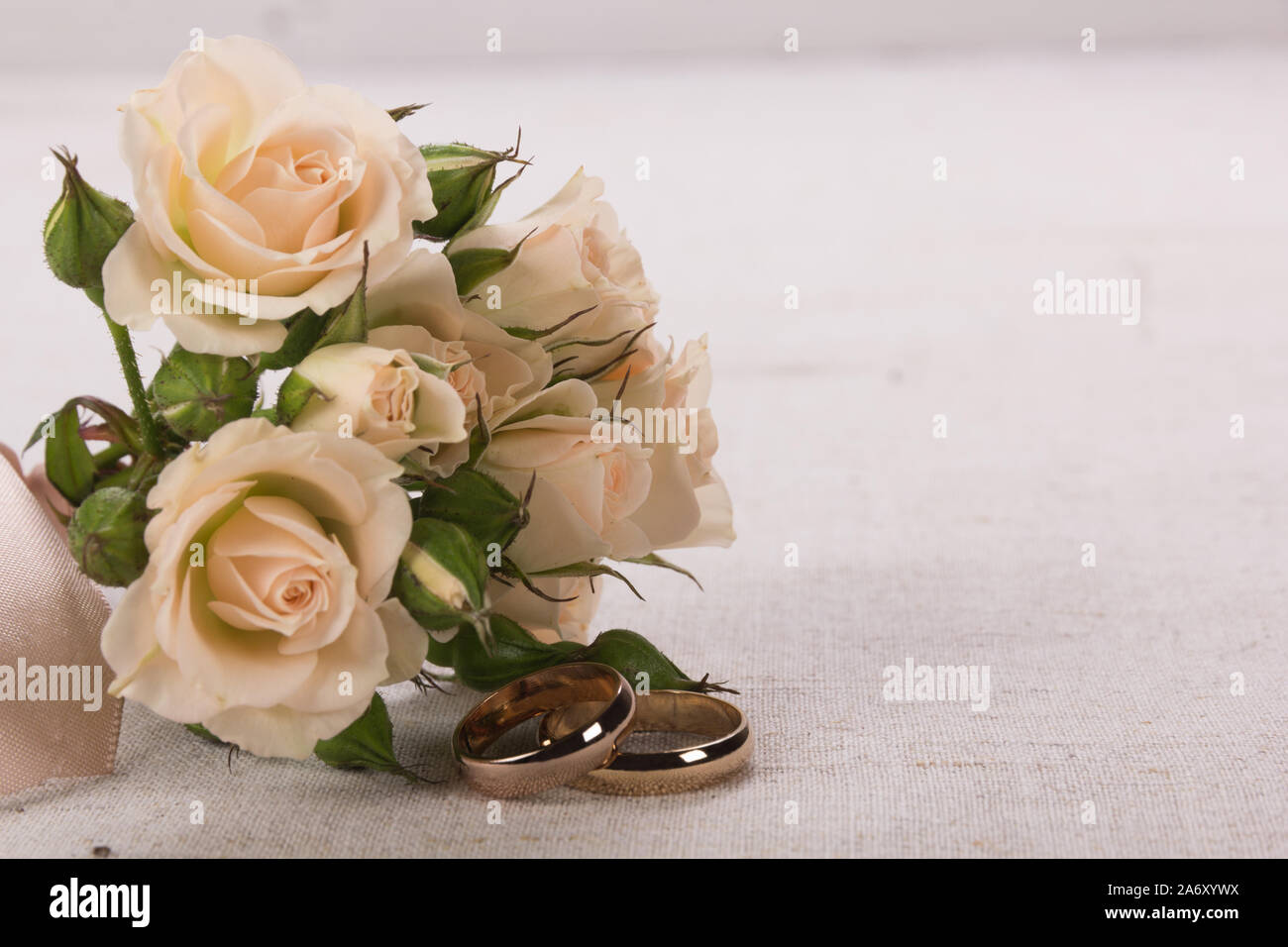 Two Roses Ring Bunch of beautiful roses and two wedding rings Stock Photo - Alamy