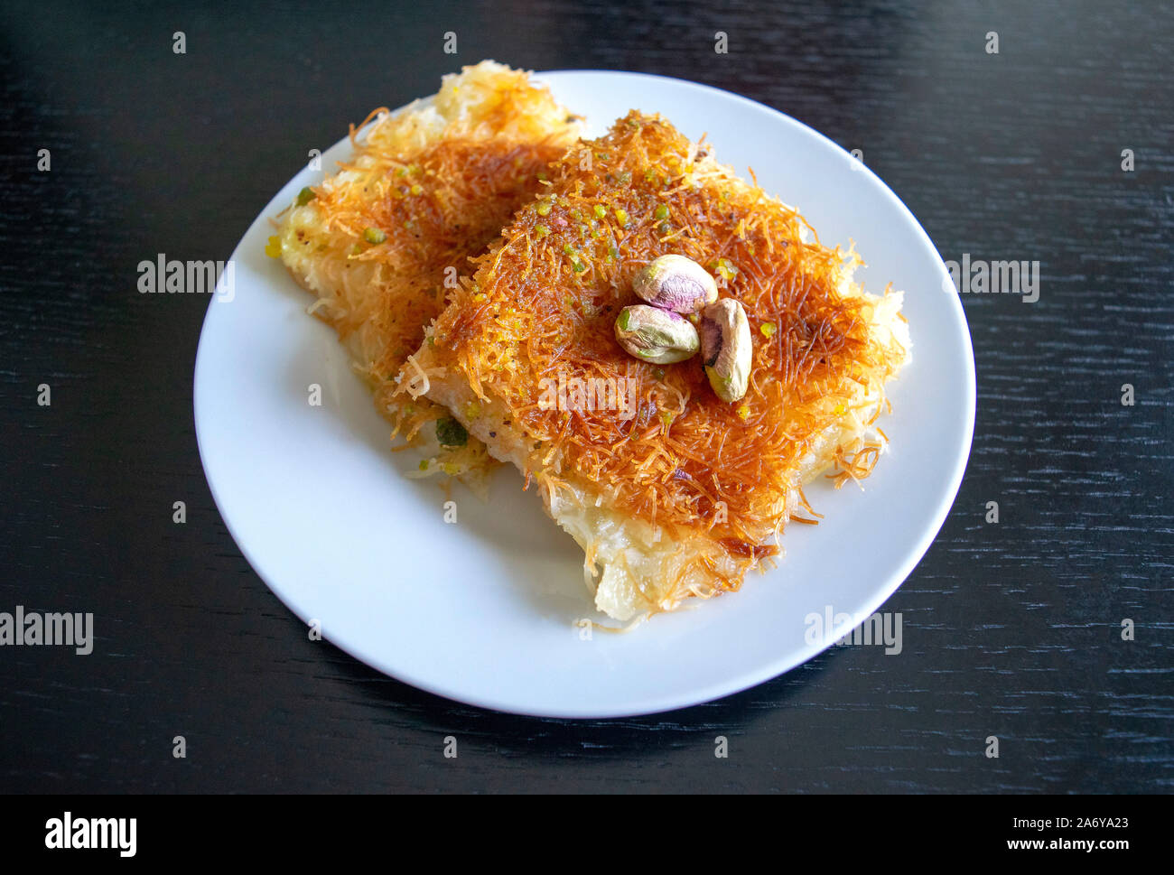 Traditional eastern dessert kunafa. Top view. Arabic cheese kunafa in