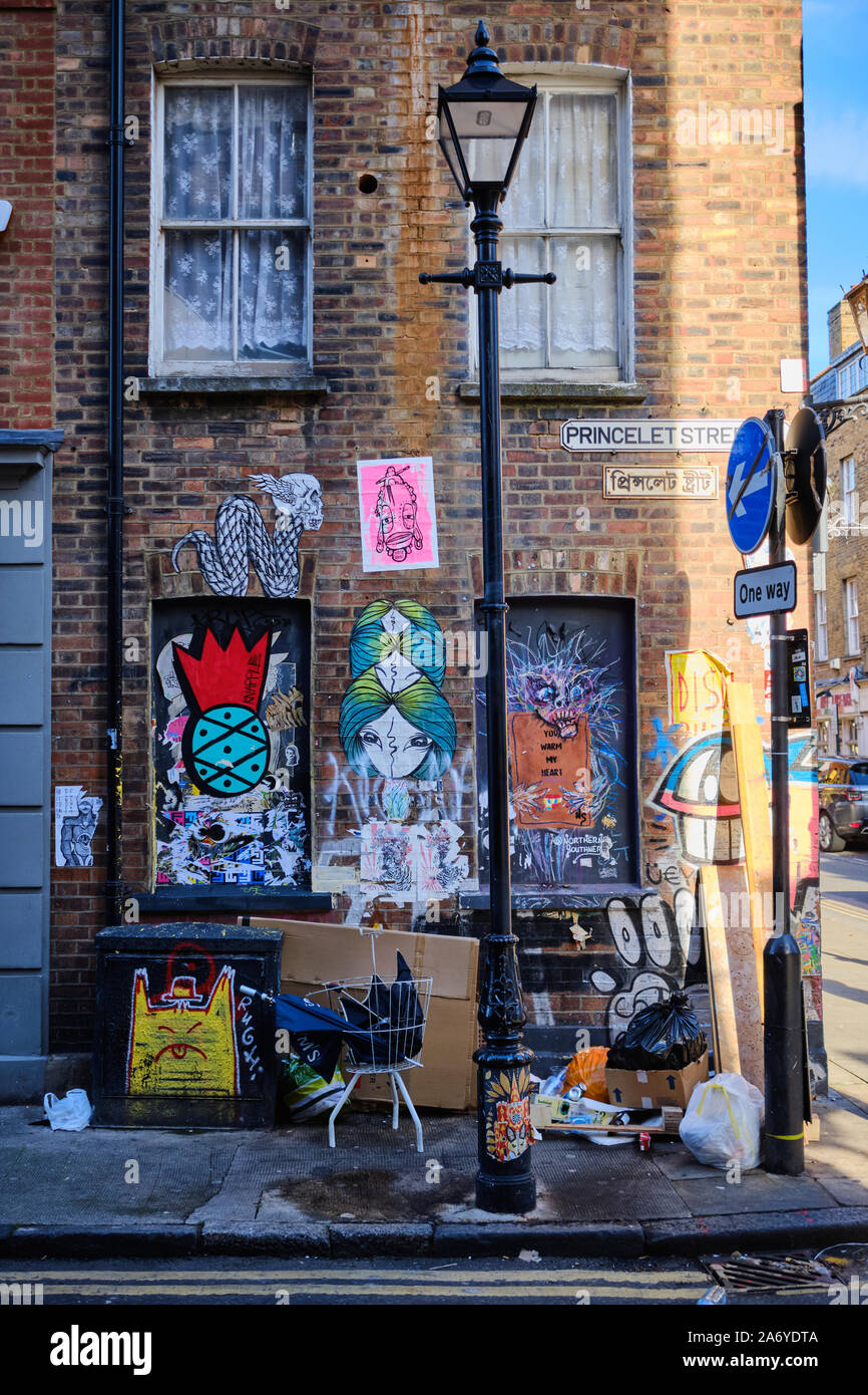 London / UK - October 27th 2019: A typical street corner on Brick Lane in Spittalfields, London with rubbish and graffiti. Stock Photo