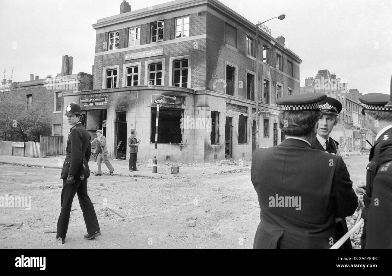 Fire blackened and damaged Brixton public house, The George in Railton Road, Brixton, London, one of the many buildings to suffer in last night's rioting. Stock Photo