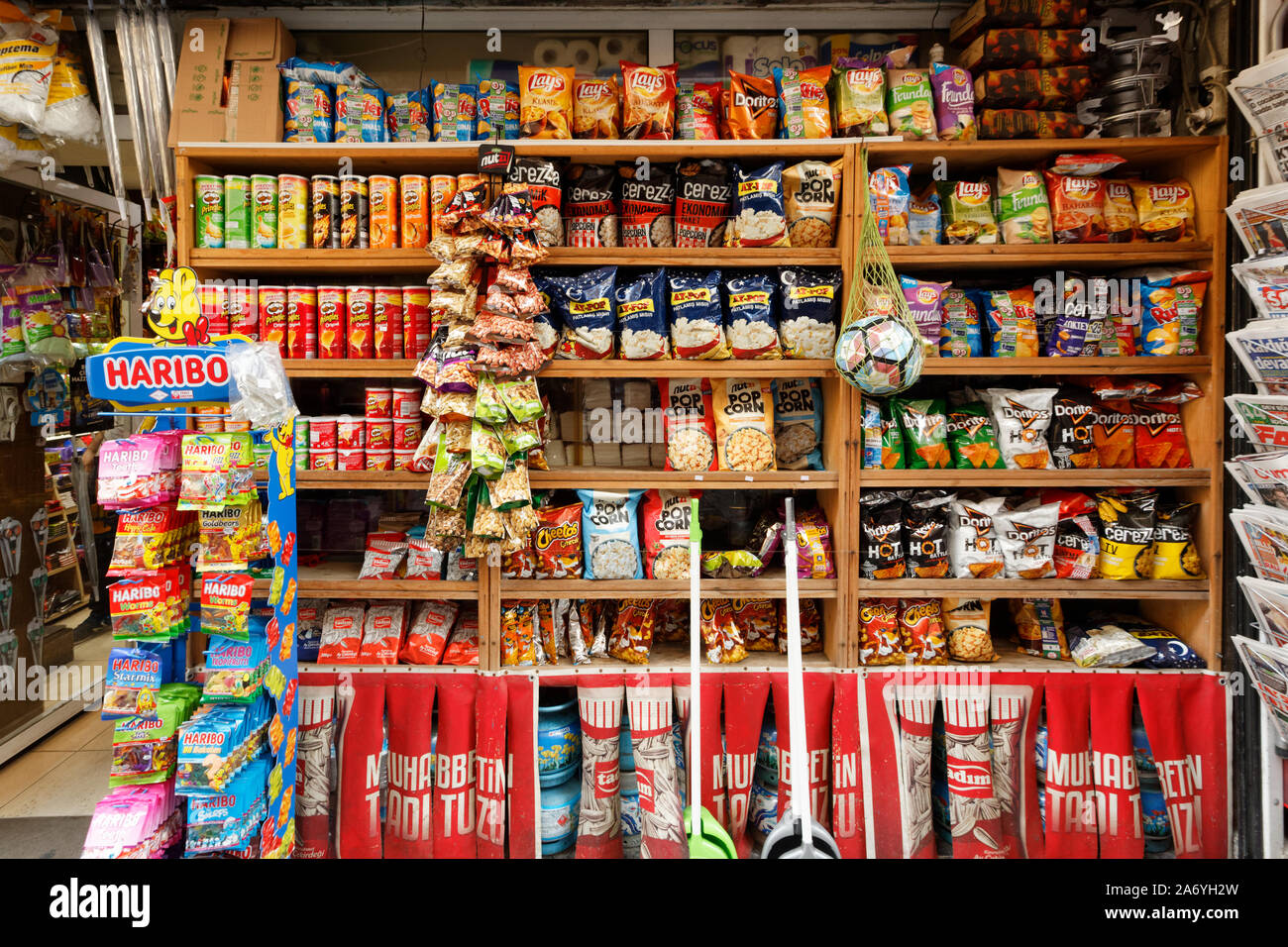 Packaged FMCG (Fast moving consumer goods) products displayed on a street shelf of traditional market at Beyoglu. Stock Photo
