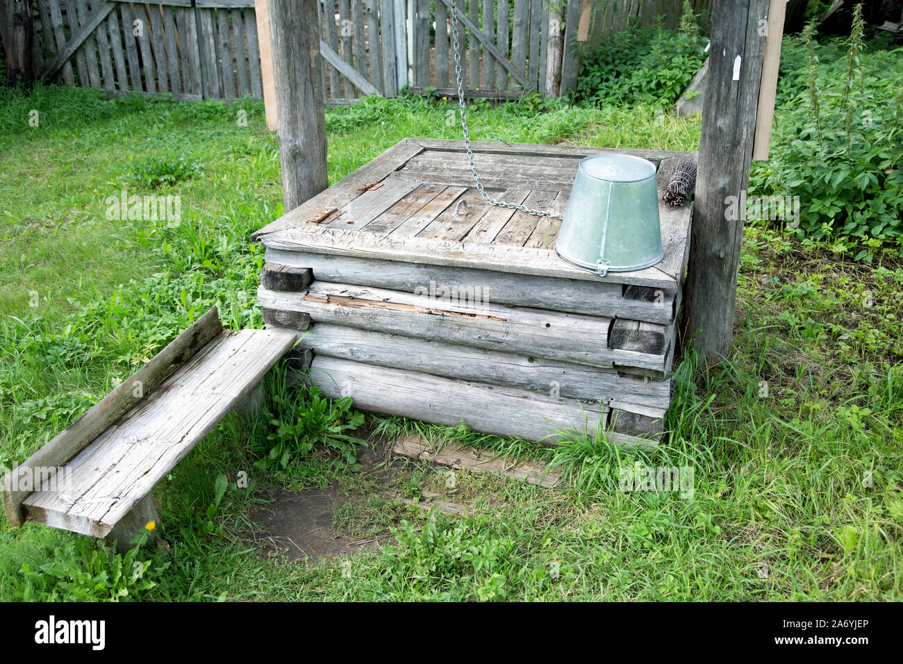 the village well is a closeup on a summer day Stock Photo