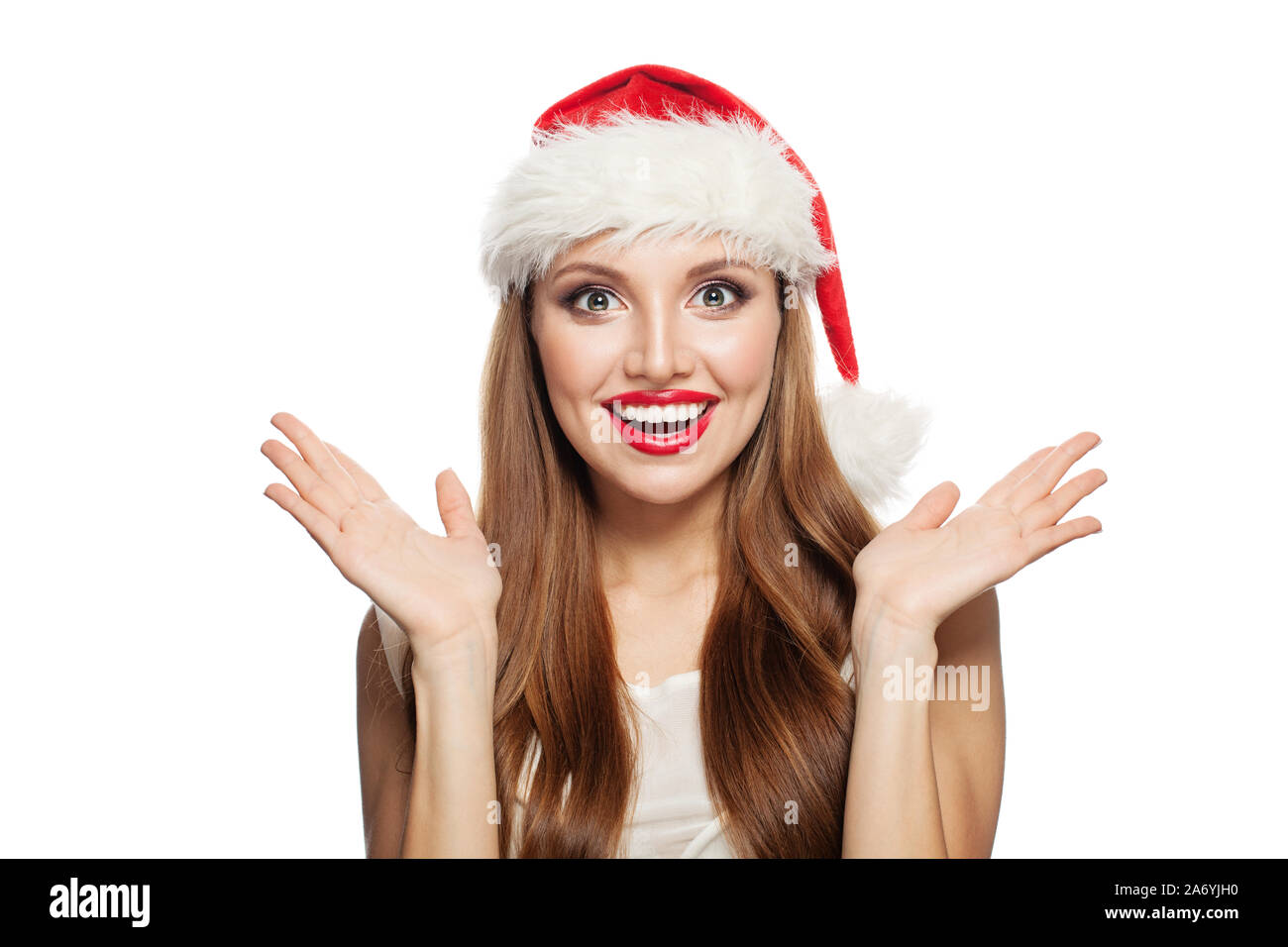 Shocked girl wearing santa hat hi-res stock photography and images - Alamy