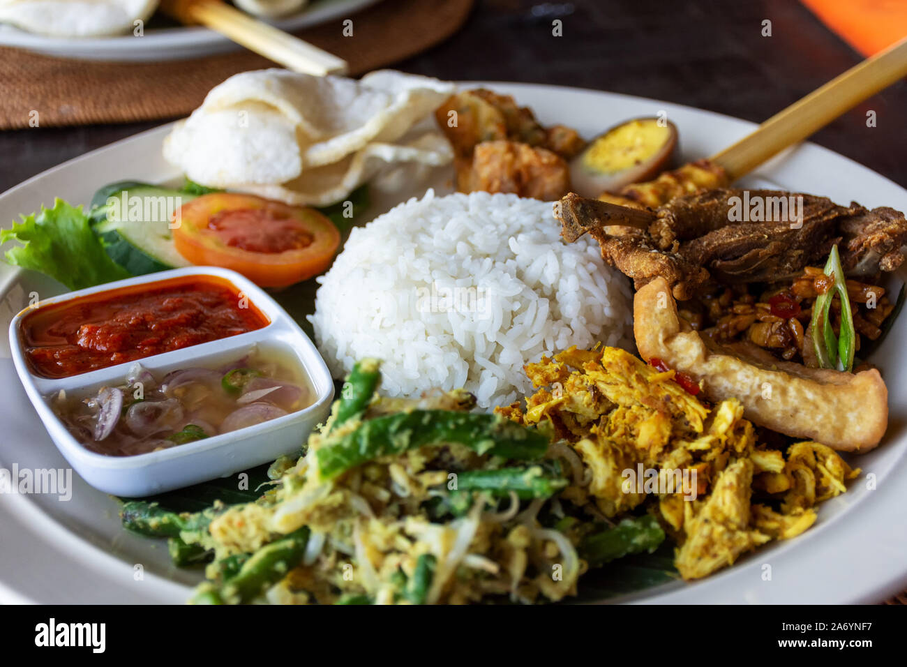 Nasi Campur Bali Bebek Betutu translate Balinese Mixed Duck Rice, Indonesian Balinese cuisine. Stock Photo