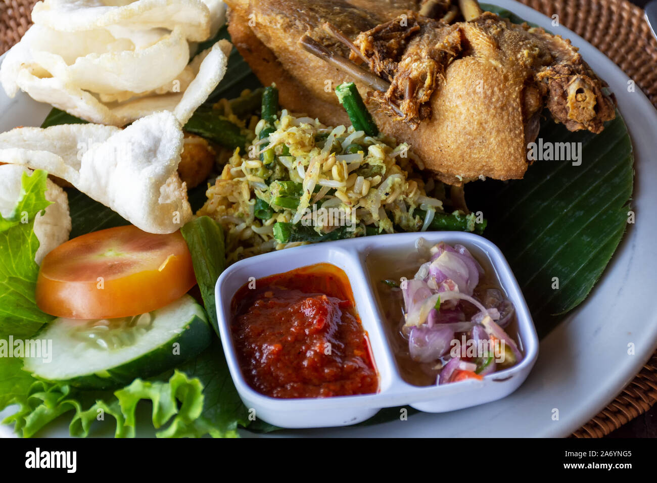 Nasi Campur Bali Bebek Betutu translate Balinese Mixed Duck Rice, Indonesian Balinese cuisine. Stock Photo