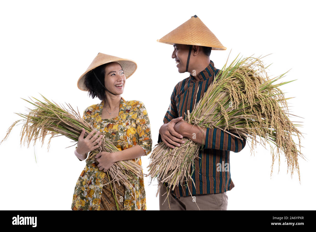 happy young couple farmer smiling to each other Stock Photo - Alamy
