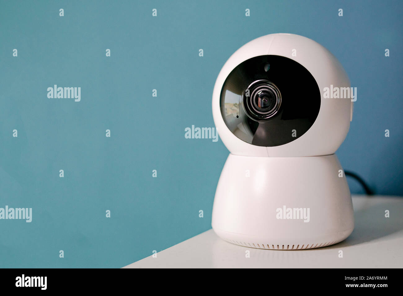 webcam with white moving head with black protections covering the lens and infrared light bulbs for night lighting Stock Photo