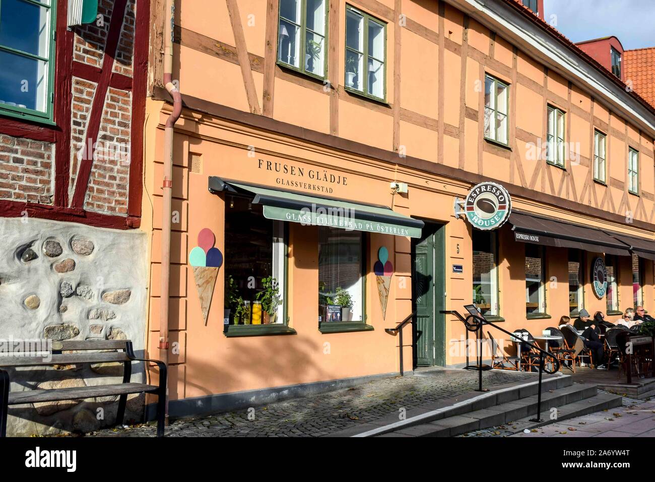 Espresso and ice cream in a sidewalk cafe setting in the Old Town of Ystad, Sweden. Stock Photo