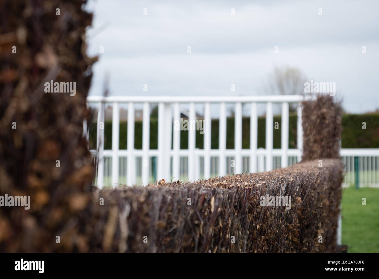 Close up of horse racing fence Stock Photo