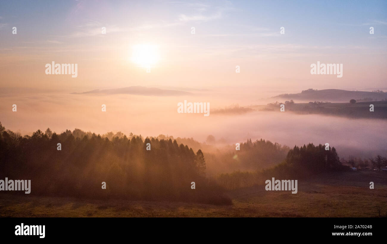 Meadow in fog at sunrise hi-res stock photography and images - Alamy