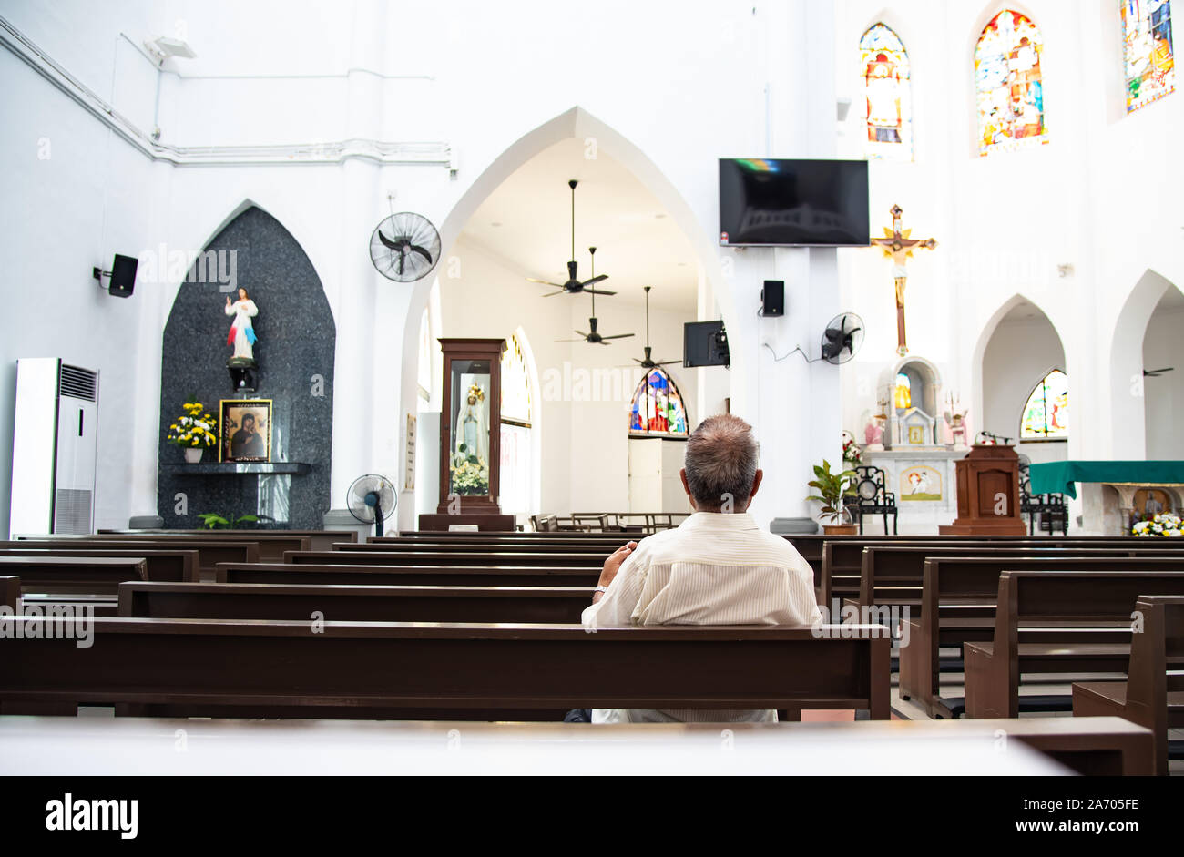 MALACCA,MALAYSIA, october ,14,2019 Unidentical of man pray in   church of Saint Francis Xavier  in Malacca heritage city  of Malaysia Stock Photo