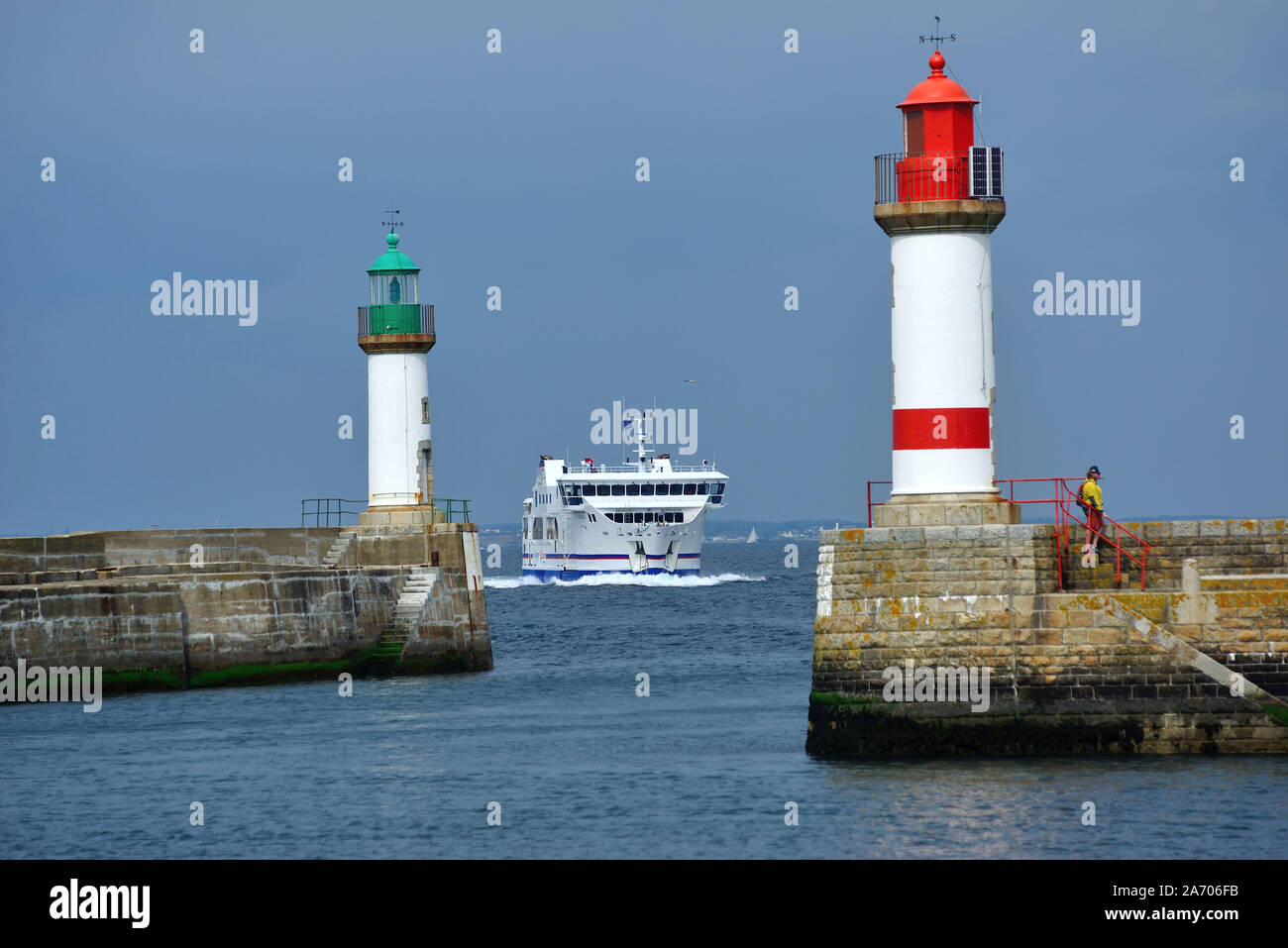 “Ile de Groix' island (off the coasts of Brittany, north-western France): water shuttle at the entrance to the harbour “Port Tudy. Boat of the shippin Stock Photo