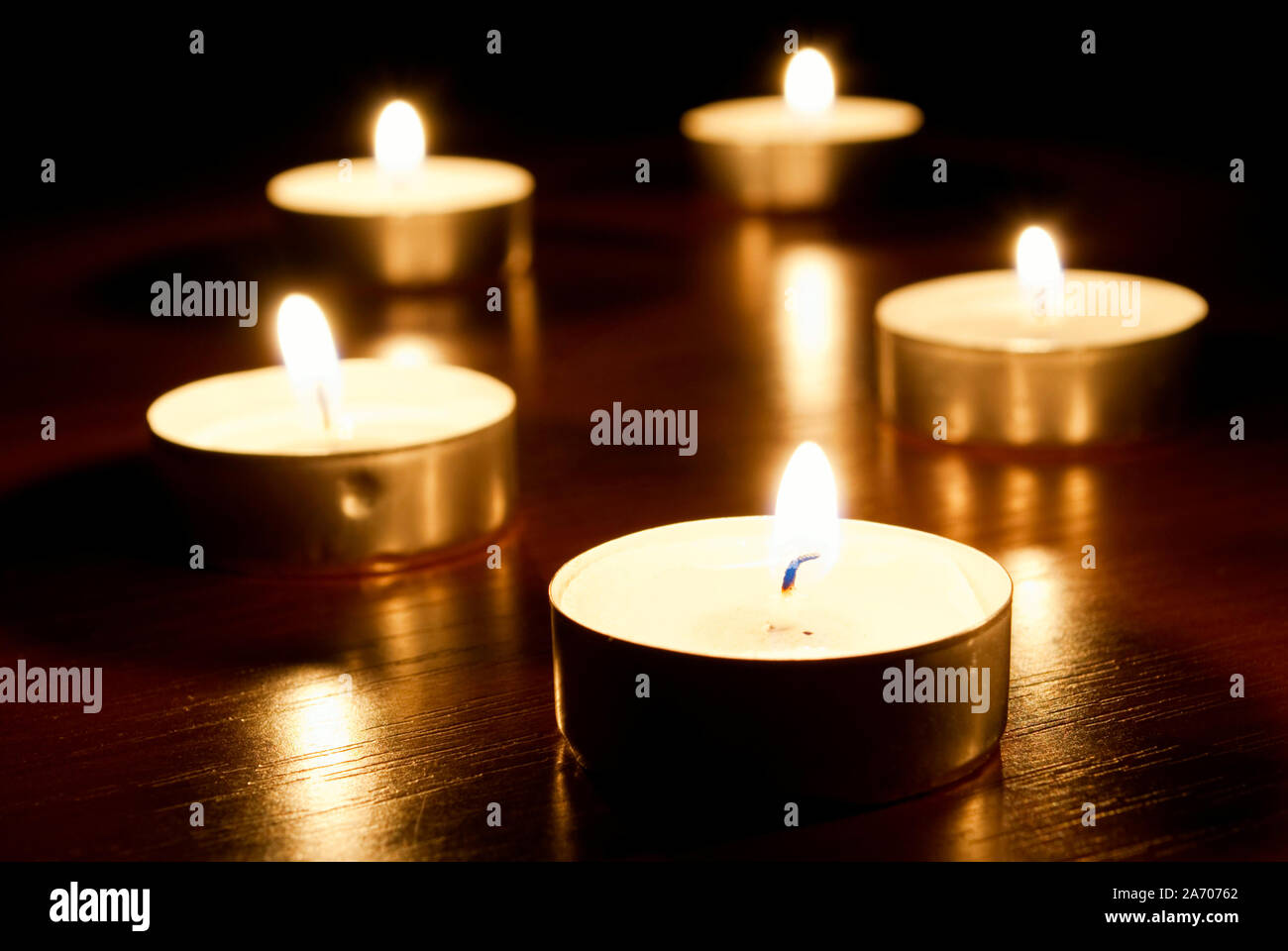a row of votives with short depth of field Stock Photo Alamy