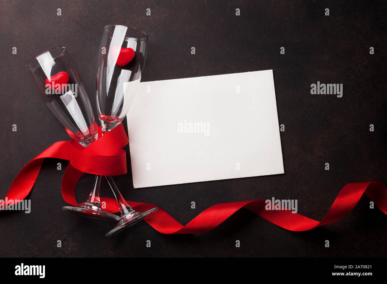 Valentine's day greeting card with champagne glasses and candy hearts ...