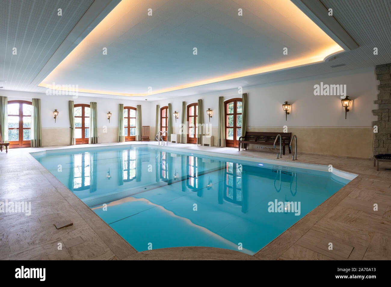 Indoor swimming pool in a private luxury villa. No one inside Stock