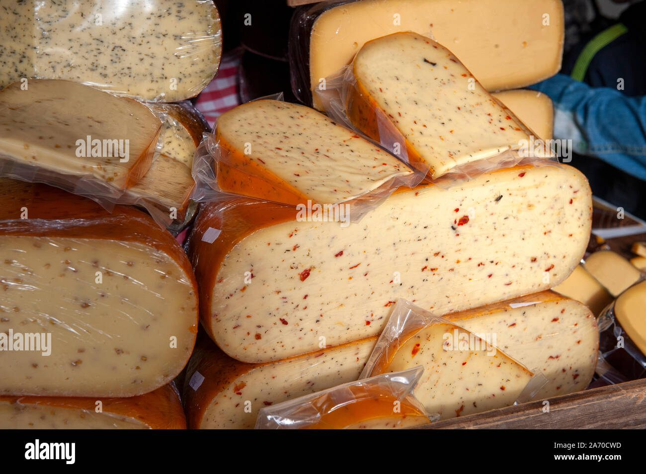 Dutch cheese wrapped up in plastic Stock Photo Alamy