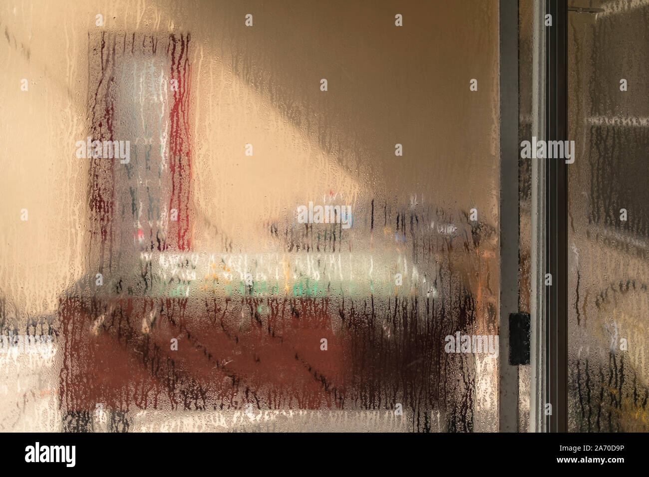 Air conditioning causes condensation to form on sliding glass door