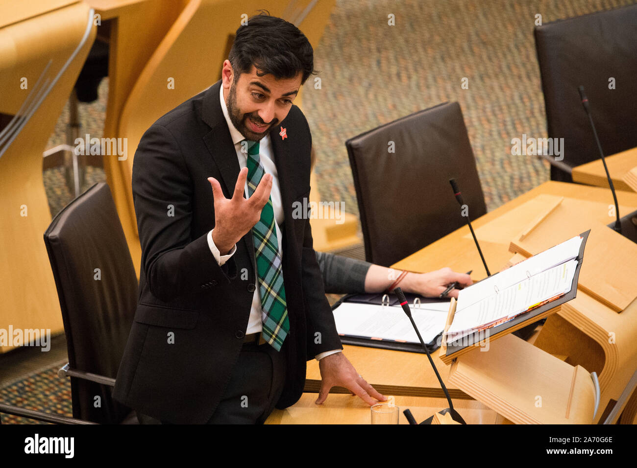 Edinburgh, UK. 29th Oct, 2019. Edinburgh, 29 October 2019.Pictured: Yousaf Humza MSP - Cabinet Minister for Justice. Speaking in the Parliament about the 39 Chinese people found dead in the back of a lorry in response to a question being asked: To ask the Scottish Government what resources it is allocating to address human trafficking and exploitation. Credit: Colin Fisher/Alamy Live News Stock Photo