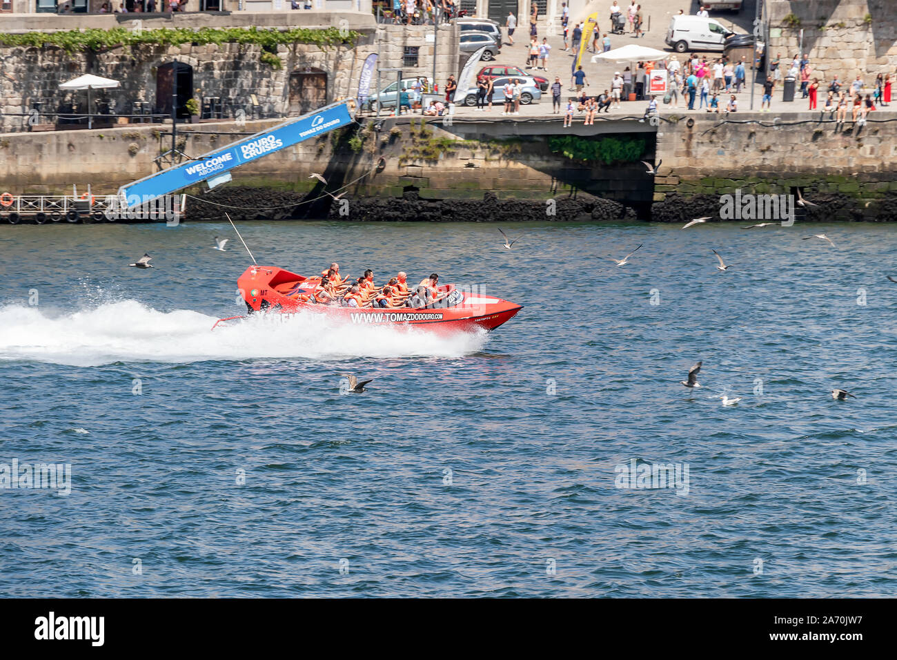 Oporto, Portugal - July 19, 2019: Xtreme Jet Boat River Safari in Porto,  Portugal. High speed red boat over Douro river Stock Photo - Alamy