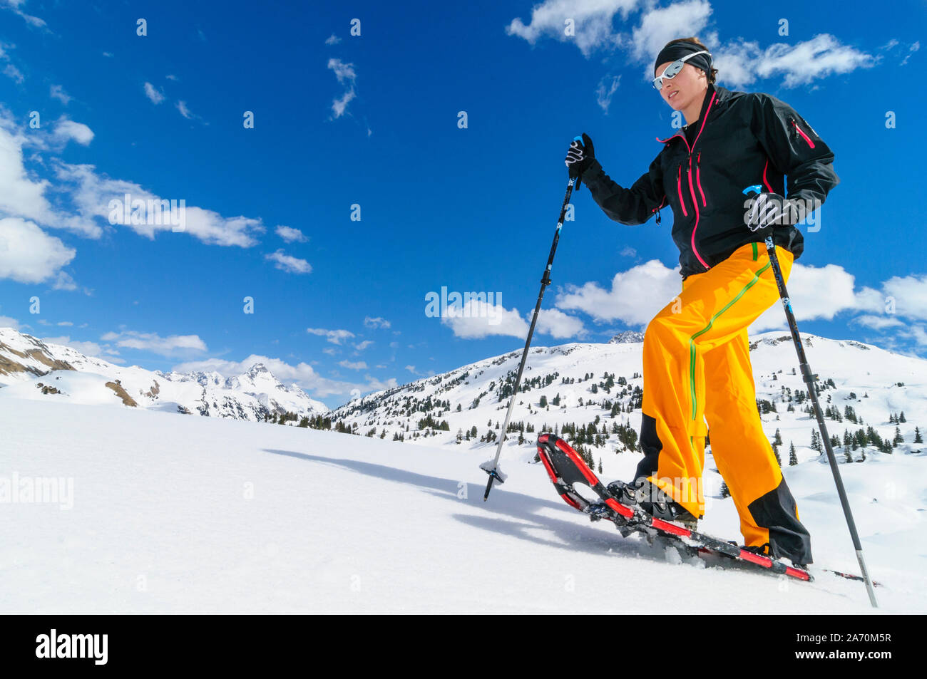 Hiking with snowshoes at a beautiful day in late winter Stock Photo
