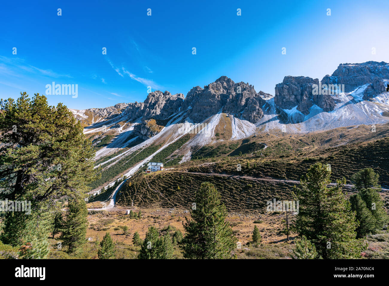 View at the Senders valley and  Adolf Pichler mountain hut near Kemater Alm in Austria with high rising mountains (Kalkkoegel)  in the background Stock Photo