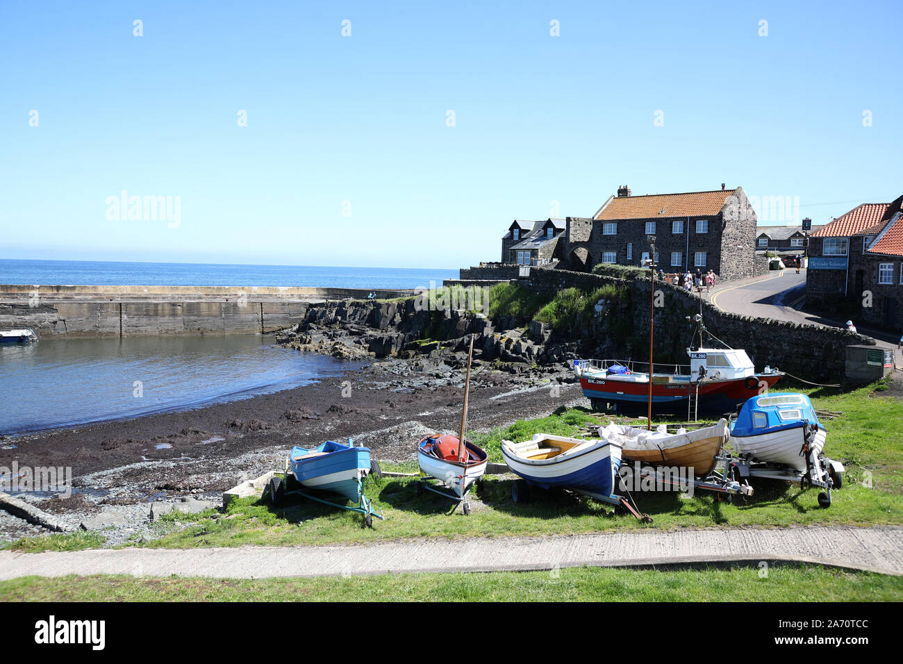 Craster is a small fishing village on the Northumberland coast of England Stock Photo