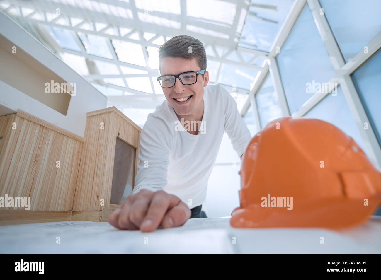 experienced architect doing calculations for new project Stock Photo