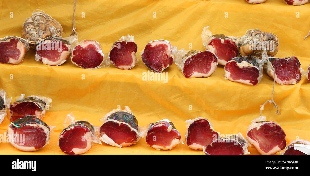 raw ham vacuum packed for sale in market Stock Photo