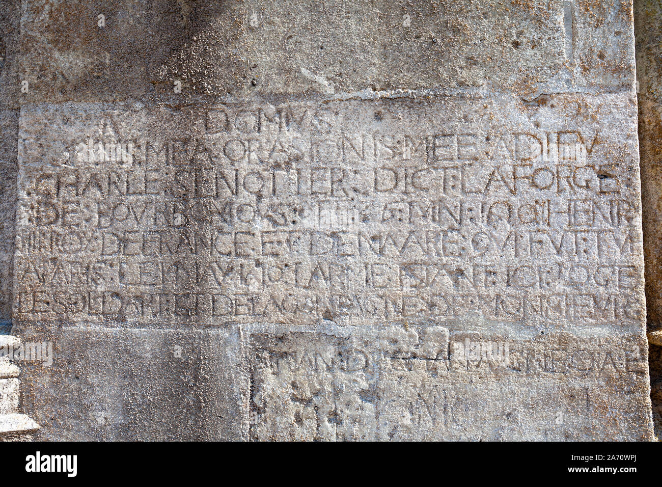 Europe, France, Grand Est, L'Epine, The Basilique Notre-Dame de l'Épine, Ancient Latin script carved into stonework Stock Photo