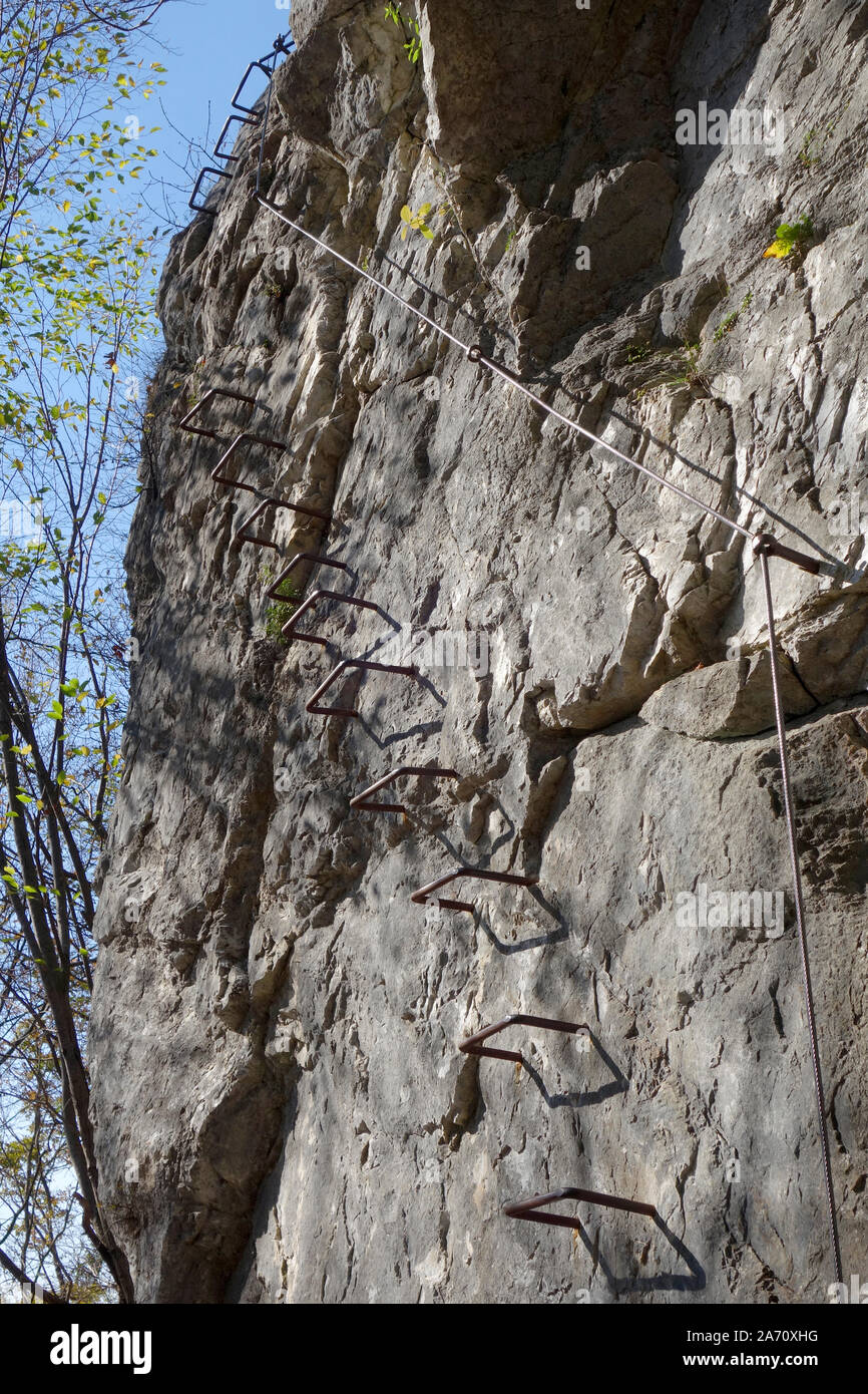 'Via Ferrata' (Iron Path) with bolts and steel wire protected climbing route Stock Photo