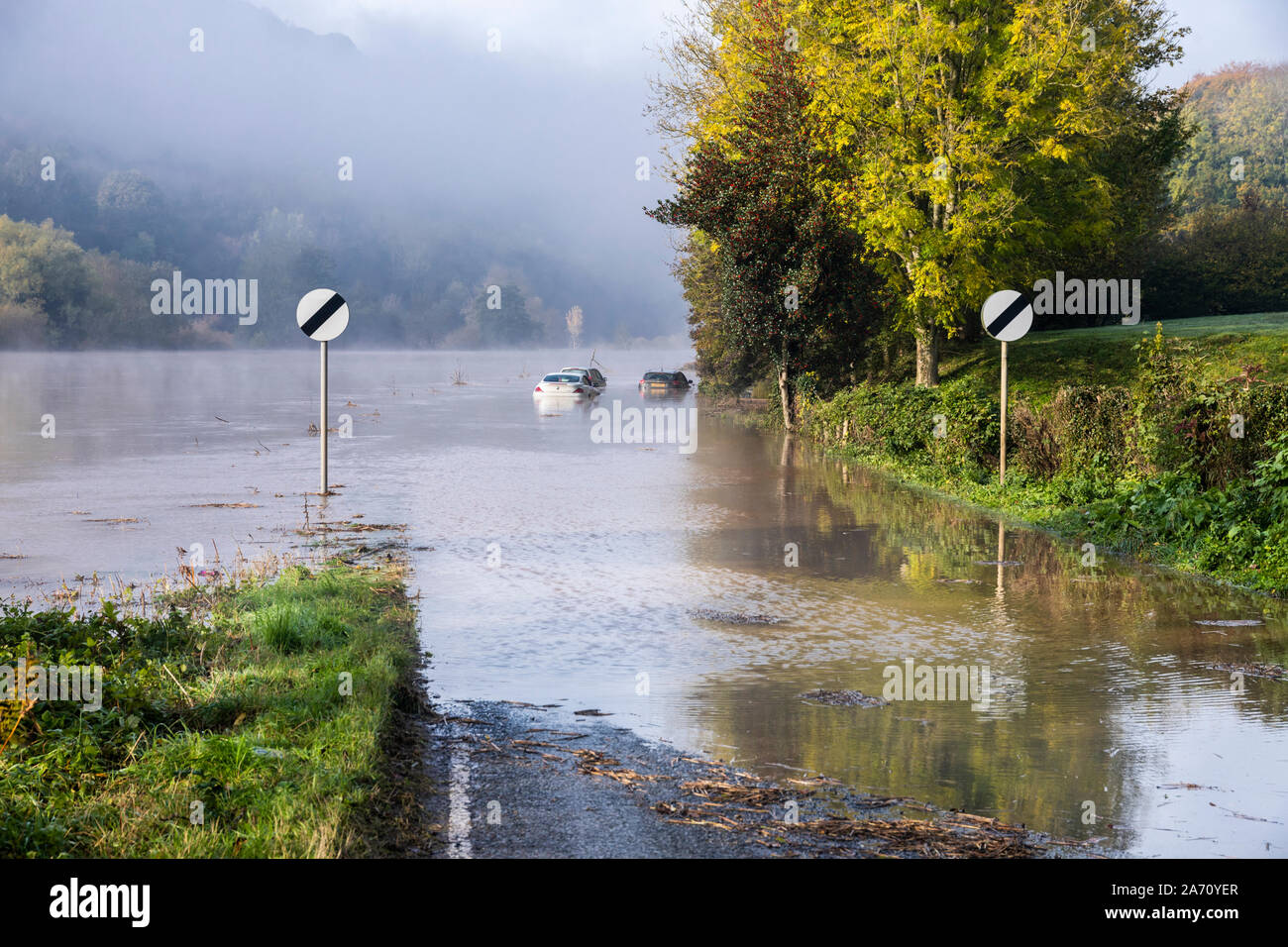 Cars stuck in flood water on B4234 beside the River Wye on the Gloucestershire/Herefordshire border on 28.10.2019 nr Lower Lydbrook, Gloucestershire Stock Photo