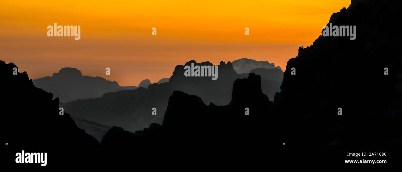 Mountain ranges at sunset in the Sexten Dolomites / Dolomiti di Sesto / Sextener Dolomiten, nature reserve in South Tyrol, Italy Stock Photo