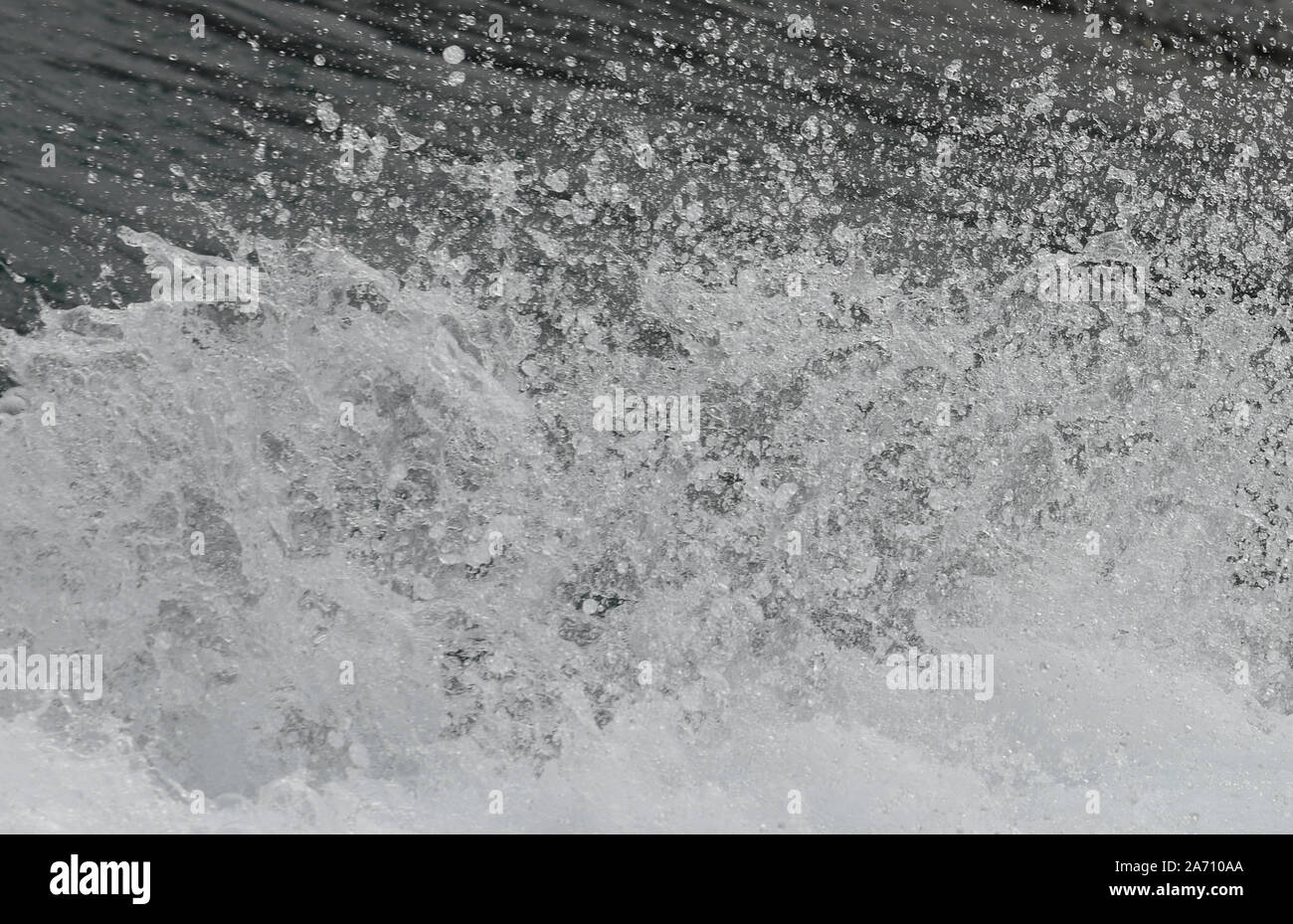 background of a spray of water and water droplets left in the wake of a jet boat Stock Photo