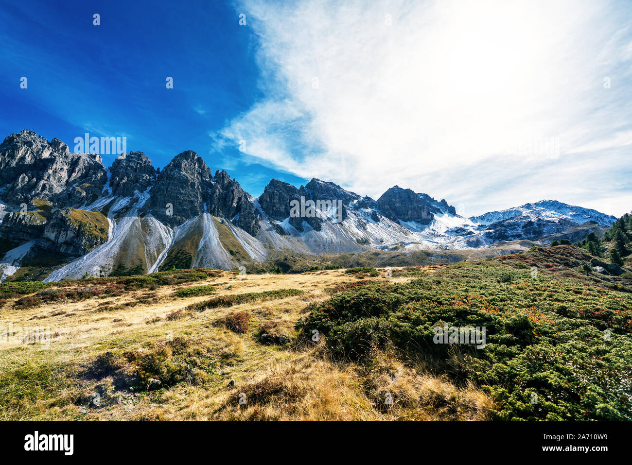 Panoramic view of the austrian Kalkkoegel alpine mountains near Kemater Alm on a sunny autumn day with clear blue skies Stock Photo