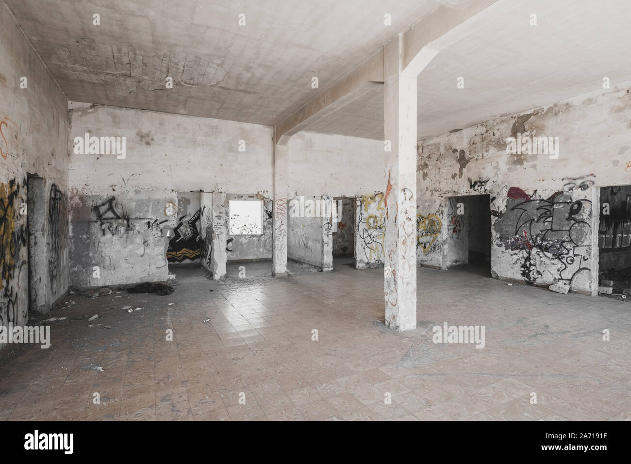 empty run down room inside abandoned building ruin Stock Photo