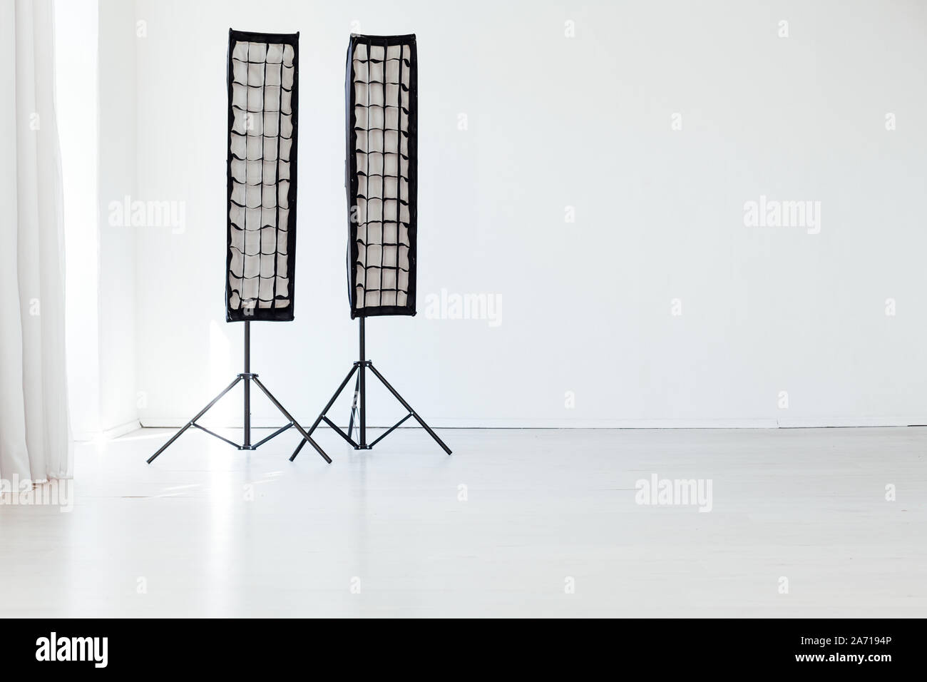 Photo studio equipment flash accessories photographer on a white ...