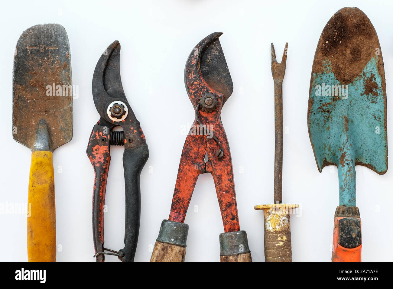 old tools, vintage garden tool set on white background Stock Photo