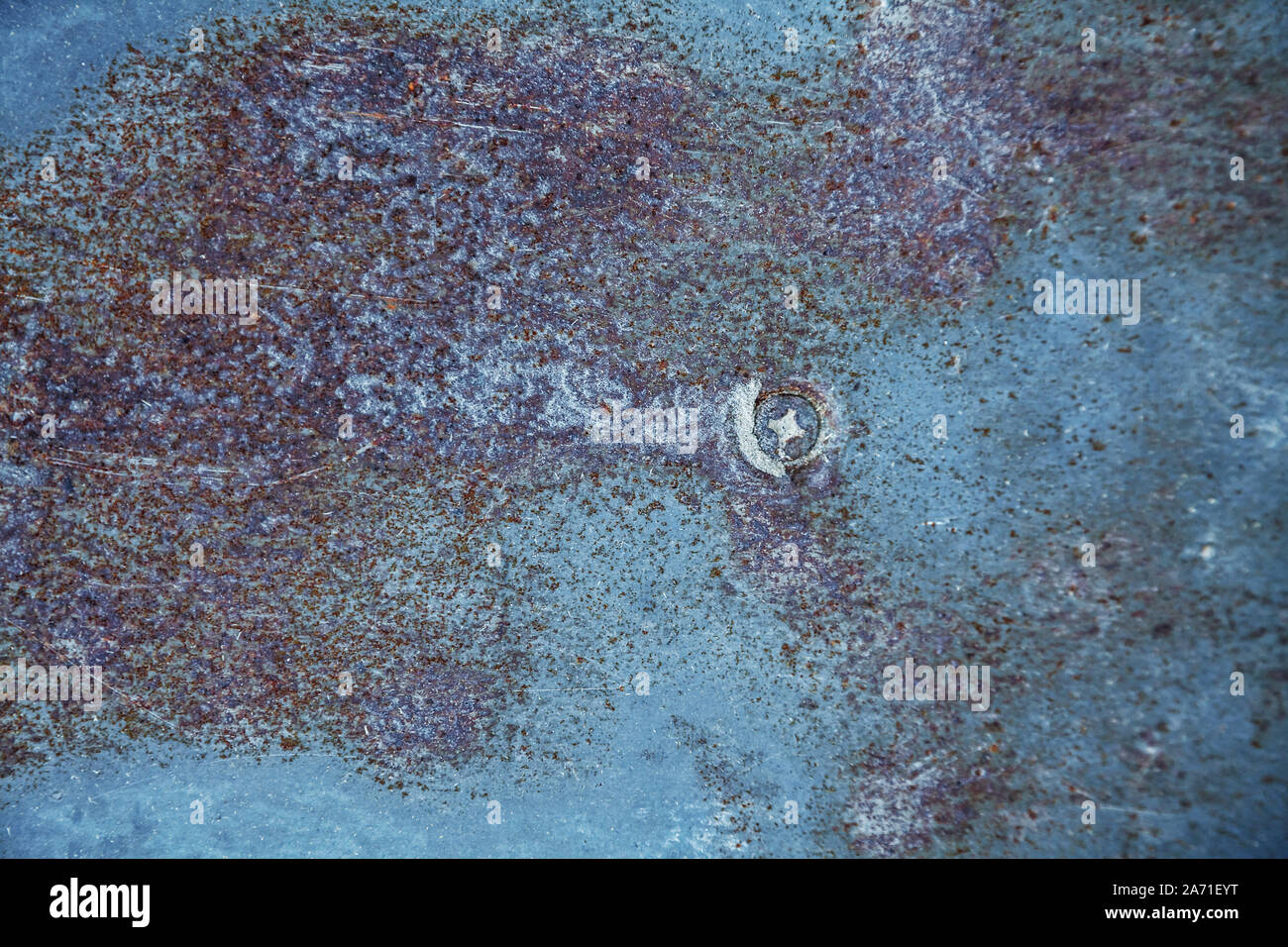 Rusty metallic surface texture with a screw in it Stock Photo - Alamy