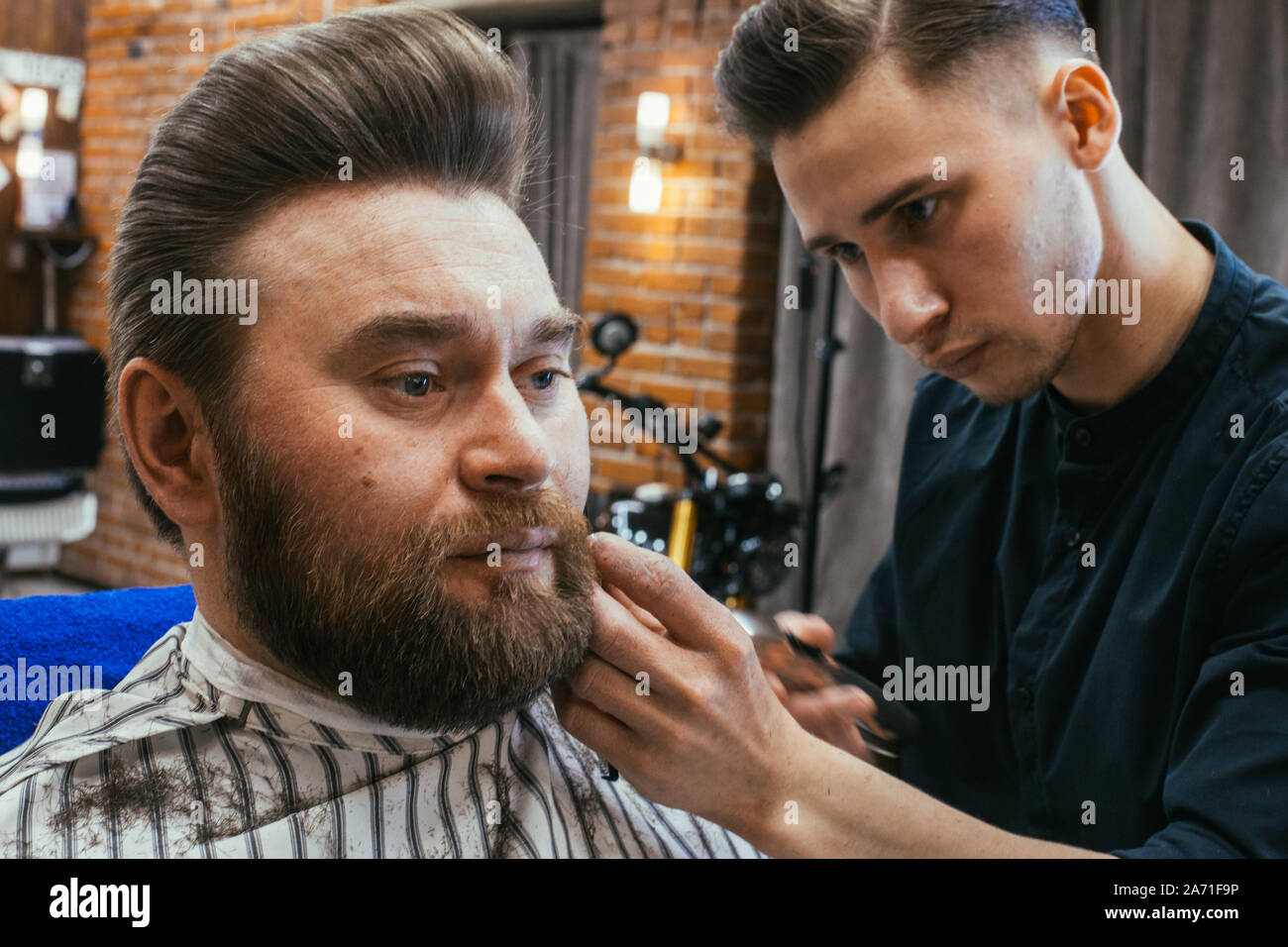 Barber shop, a man with a beard cut hairdresser. Beautiful hair and care, hair salon for men. Professional haircut, retro hairstyle and styling. Custo Stock Photo - Alamy Barber shop, a man with a beard cut hairdresser. Beautiful hair and care, hair salon for men. Professional haircut, retro hairstyle and styling. Custo Stock Photo - Alamy