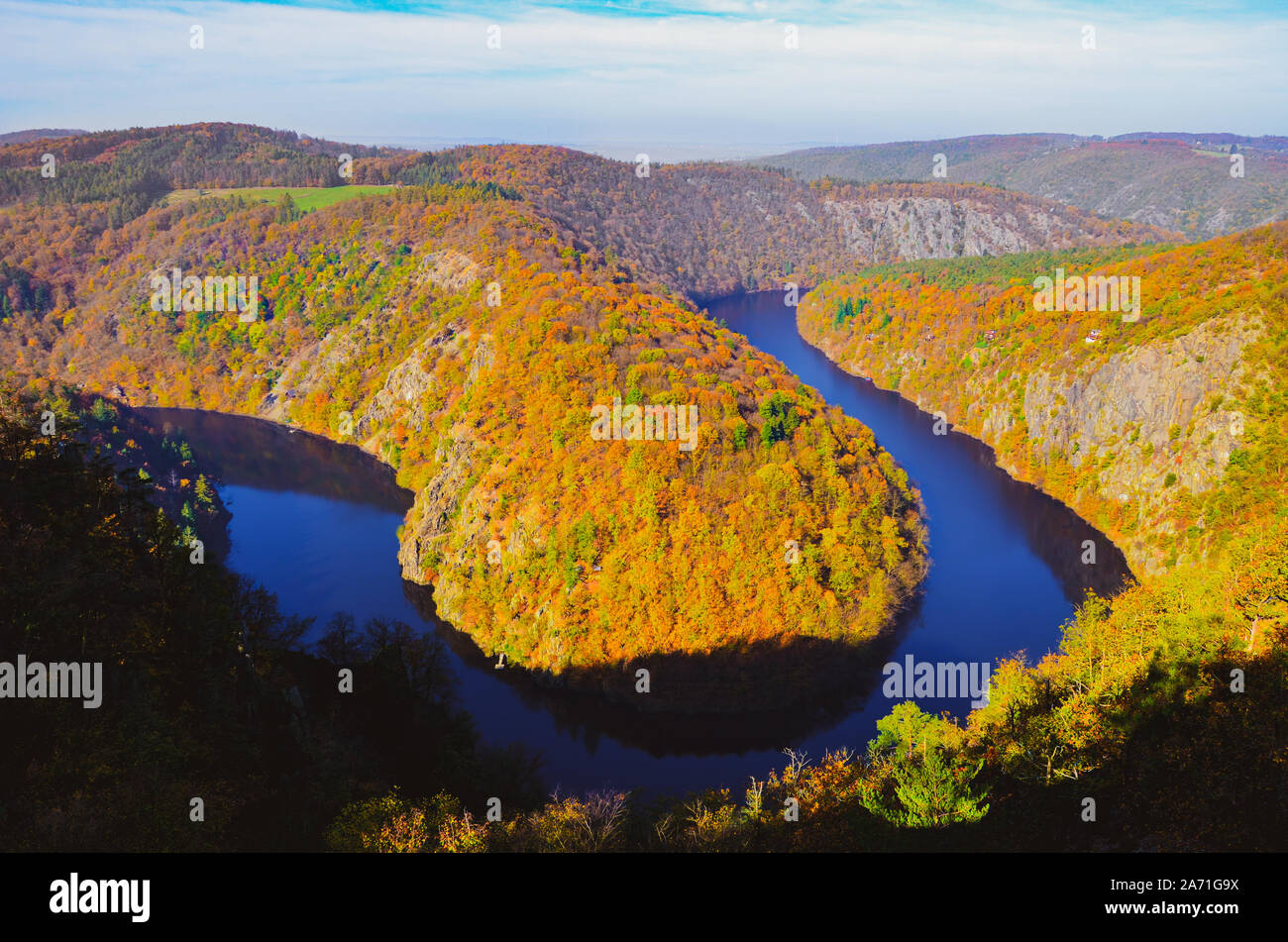 Beautiful Vyhlidka Maj, Lookout Maj, near Teletin, Czech Republic. Meander of the river Vltava surrounded by colorful autumn forest viewed from above. Tourist attraction in Czech landscape. Czechia. Stock Photo