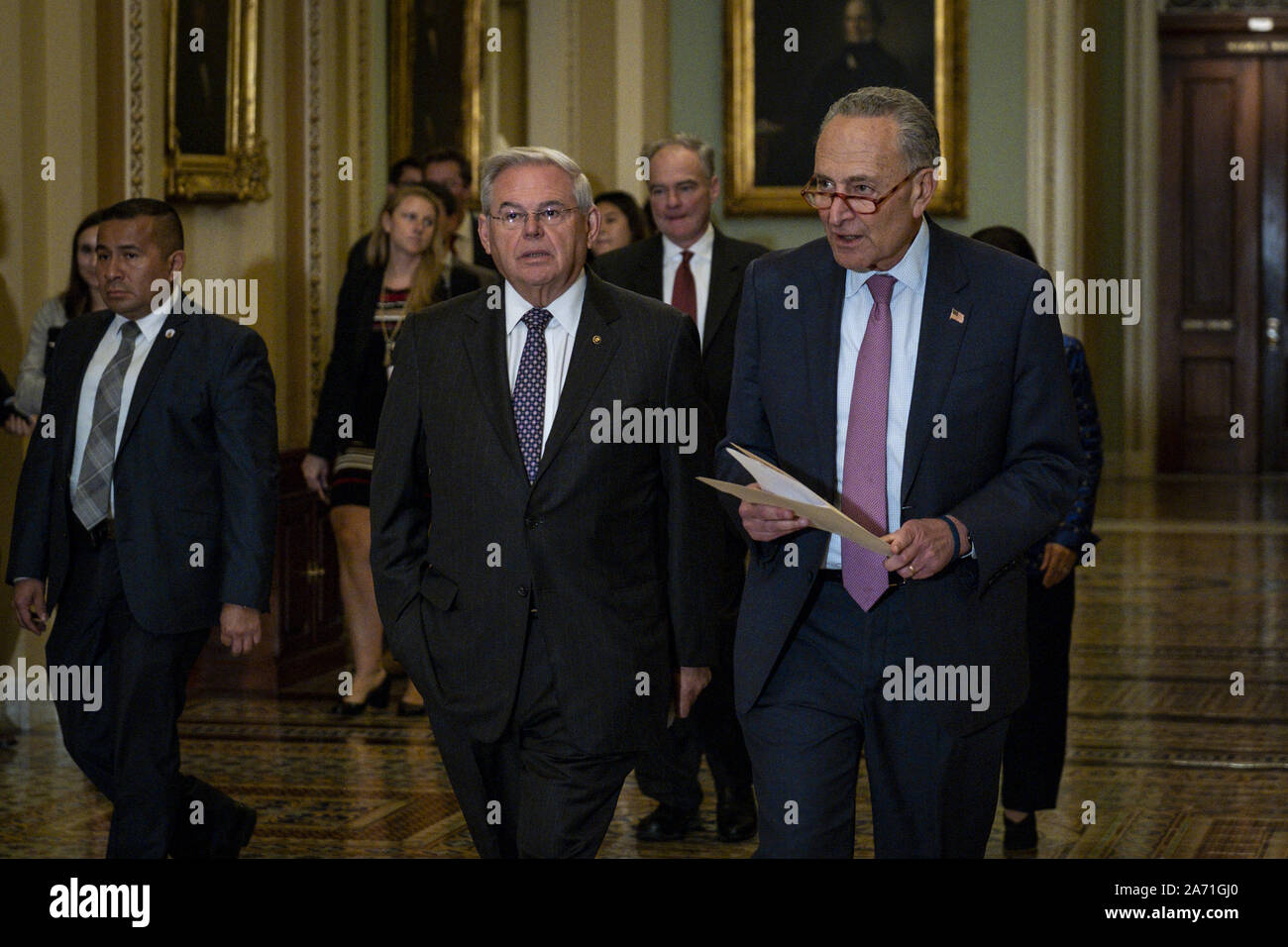 Washington, United States. 29th Oct, 2019. Senator Robert Menendez (D-NJ) and Senate Majority Leader, Chuck Schumer (D-NY) arrive to speak to reporters following the Democrats' weekly policy luncheon in the U.S. Capitol on Tuesday, October 29, 2019 in Washington, DC. Schumer said he is 'increasingly worried' that President Trump will shut down the government to distract from the impeachment inquiry. Photo by Pete Marovich/UPI Credit: UPI/Alamy Live News Stock Photo